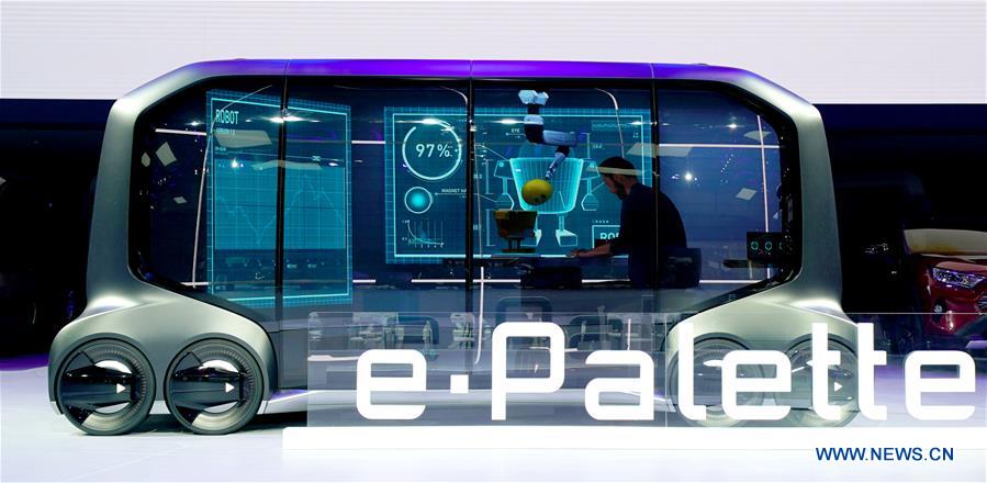 Xinhua Headlines: World's largest auto market eyes NEV, AI for new growth