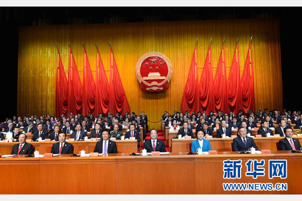 10月1日，慶祝中華人民共和國成立66周年暨新疆維吾爾自治區(qū)成立60周年大會在新疆人民會堂隆重舉行。 新華社記者 饒愛民 攝