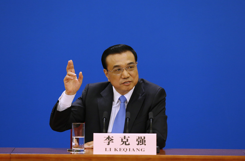 3月15日，國務院總理李克強在北京人民大會堂與中外記者見面，并回答記者提問。 新華社記者 沈伯韓 攝