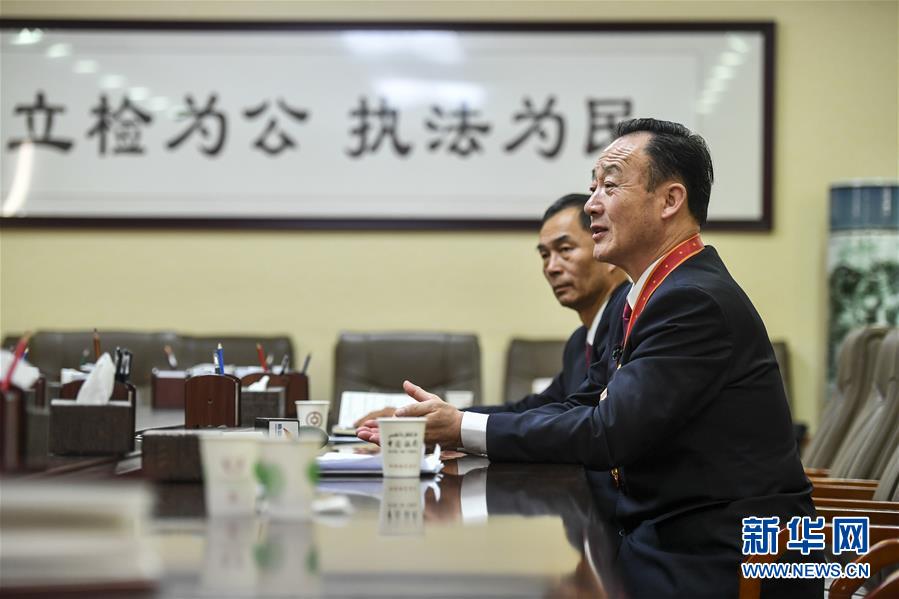 (改革先鋒風(fēng)采·圖文互動(dòng))(3)張飚:維護(hù)社會(huì)公平正義的模范檢察官