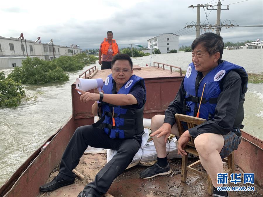 (新華全媒頭條·圖文互動)(1)筑起共御水患的鋼鐵長堤——戰(zhàn)洪一線的“干群關(guān)系新答卷”