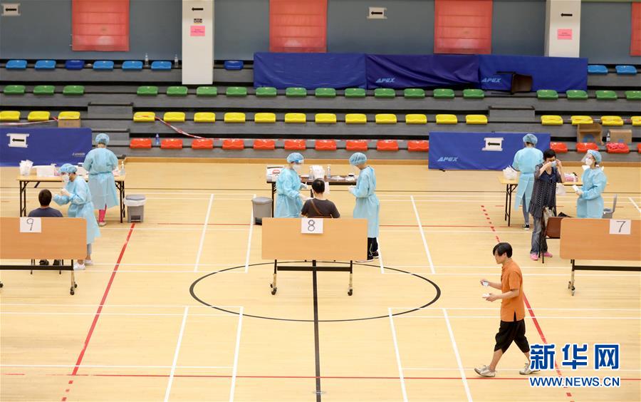 （圖文互動）（4）&ldquo;身為醫(yī)護人員一分子，應該出來幫忙&rdquo;&mdash;&mdash;參與新冠病毒社區(qū)檢測的香港醫(yī)護人員速寫