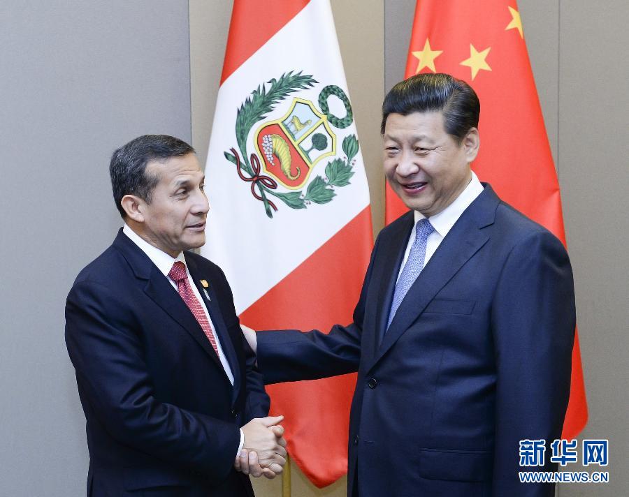 7月16日，國家主席習近平在巴西首都巴西利亞會見秘魯總統(tǒng)烏馬拉。新華社記者 劉建生 攝 