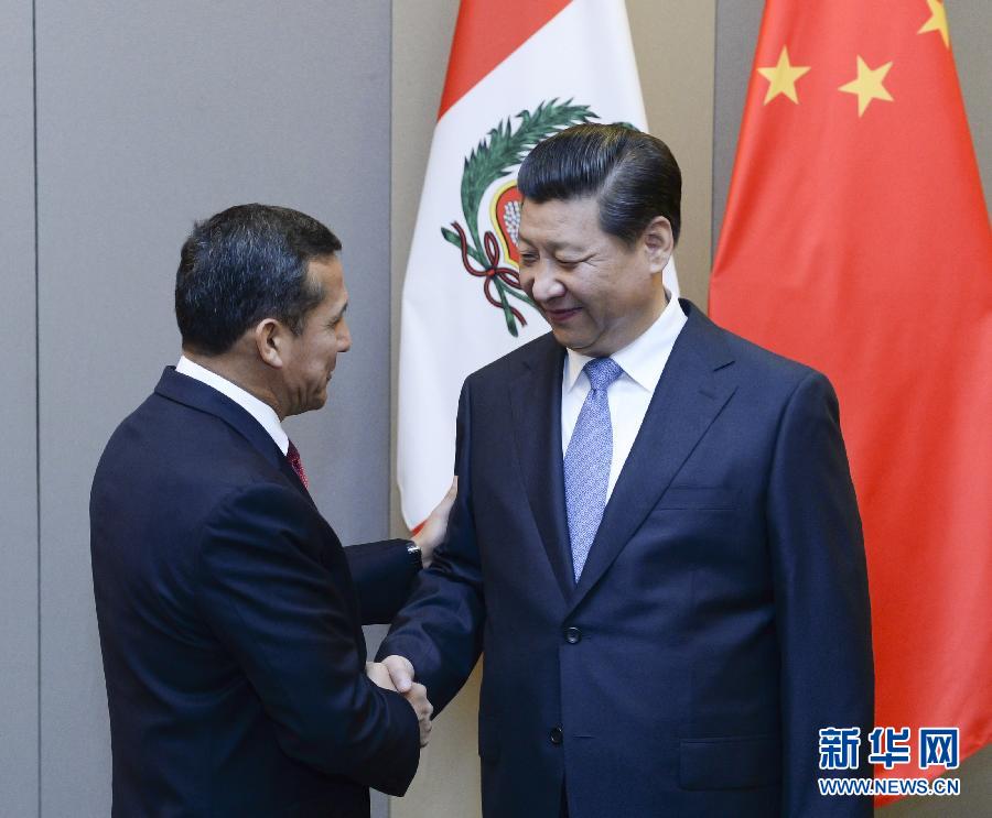 7月16日，國家主席習近平在巴西首都巴西利亞會見秘魯總統(tǒng)烏馬拉。新華社記者 劉建生 攝 