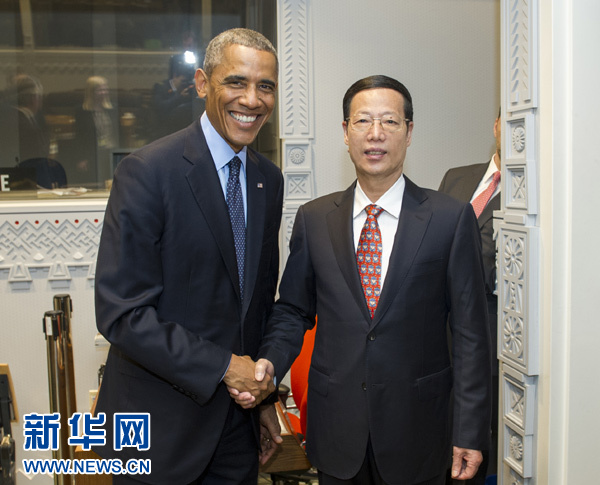 9月23日，國(guó)家主席習(xí)近平特使、國(guó)務(wù)院副總理張高麗在紐約會(huì)見(jiàn)出席聯(lián)合國(guó)氣候峰會(huì)的美國(guó)總統(tǒng)奧巴馬。 新華社記者王曄攝