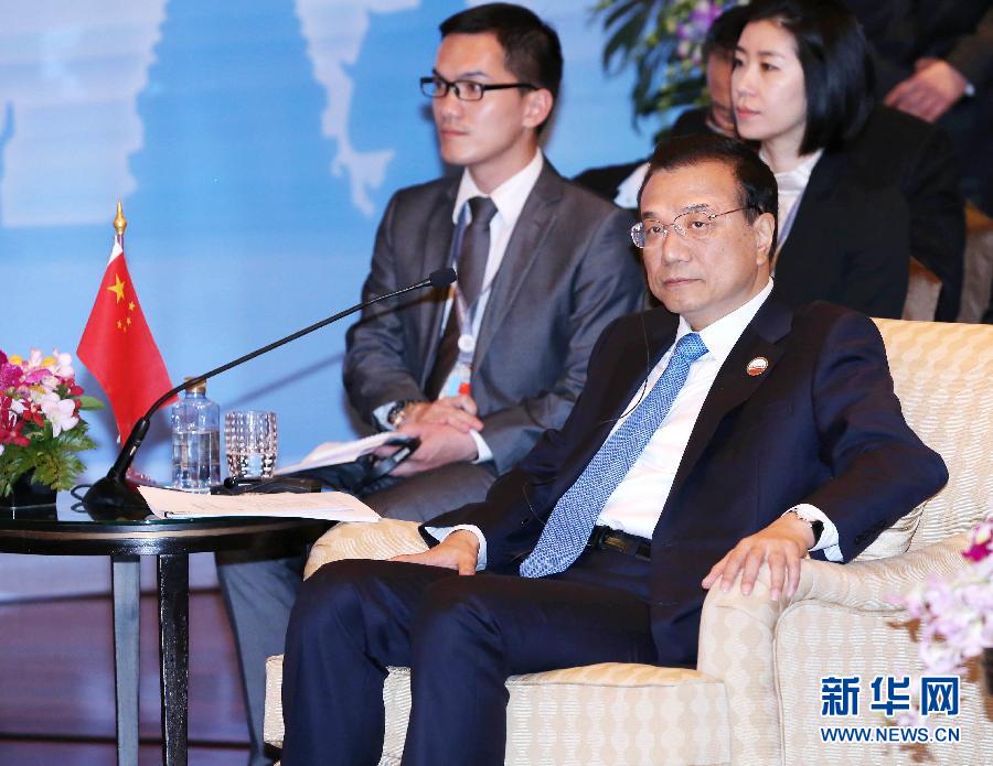 12月20日，中國國務(wù)院總理李克強(qiáng)在曼谷出席大湄公河次區(qū)域經(jīng)濟(jì)合作領(lǐng)導(dǎo)人第五次會(huì)議。 新華社記者 龐興雷 攝 