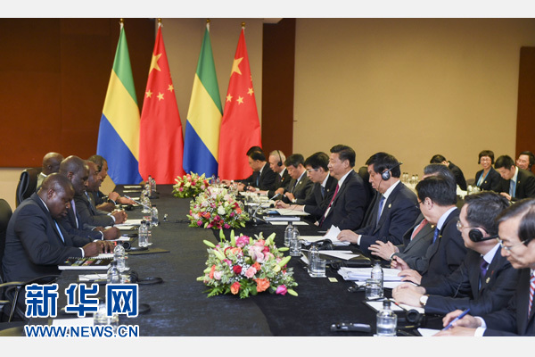 12月3日，國家主席習近平在約翰內斯堡會見加蓬總統(tǒng)邦戈。新華社記者 謝環(huán)馳 攝 