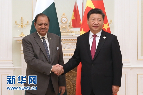 6月23日，國家主席習近平在塔什干會見巴基斯坦總統(tǒng)侯賽因。新華社記者馬占成攝