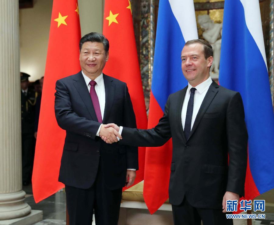 7月4日，國家主席習近平在莫斯科會見俄羅斯總理梅德韋杰夫。新華社記者 劉衛(wèi)兵 攝