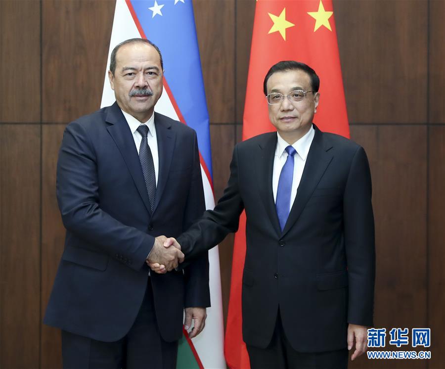 (時(shí)政)李克強(qiáng)會(huì)見烏茲別克斯坦總理阿里波夫