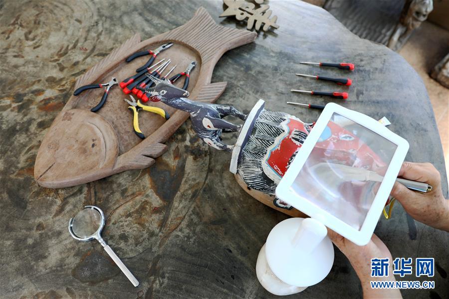 (國際·圖文互動)(6)通訊:收藏“非洲之美”的中國人——訪幾內(nèi)亞灣非洲國際藝術(shù)博物館館長謝燕申